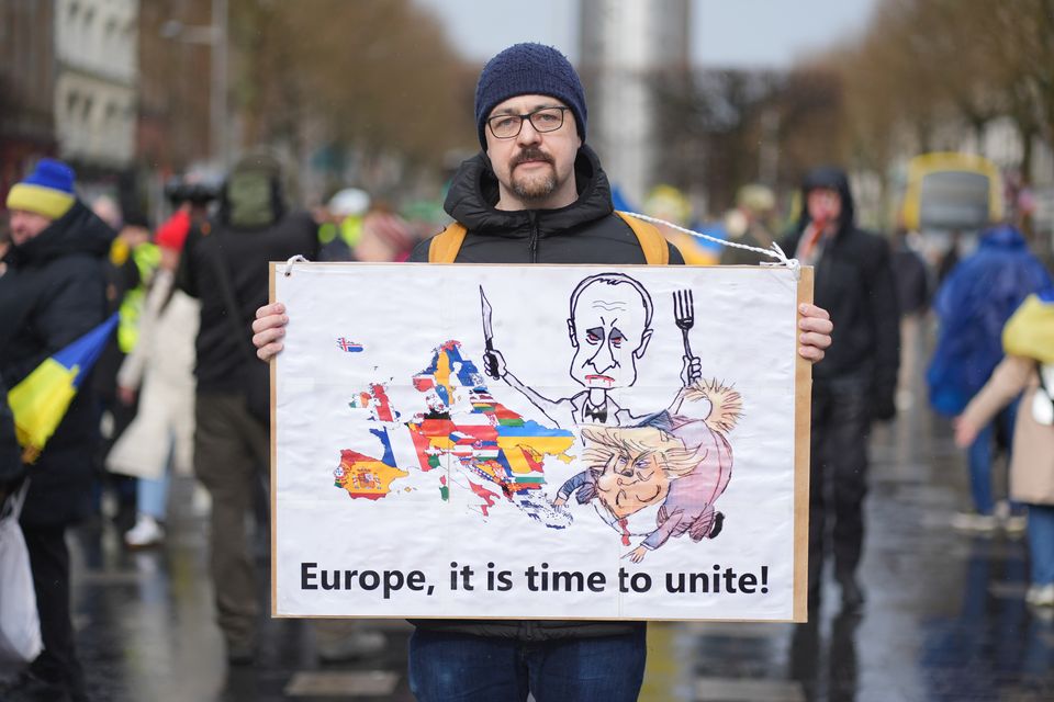 Sergey Parshin with his sign joins people taking part in a demonstration outside the GPO on Dublin’s O’Connell Street to mark three years since Russia invaded Ukraine. Picture date: Sunday February 23, 2025.