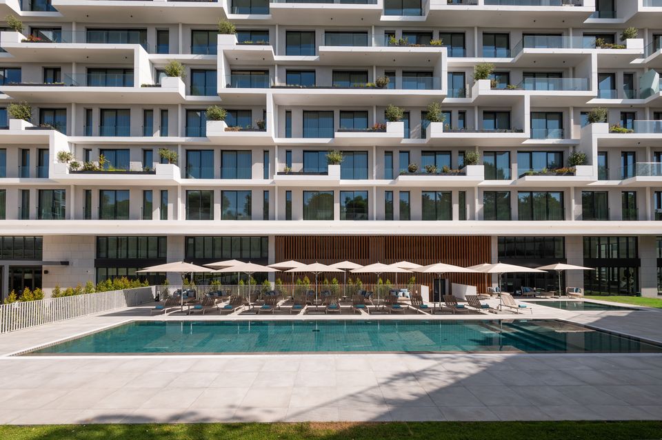 The terrace and pool area at Martinhal Oriente