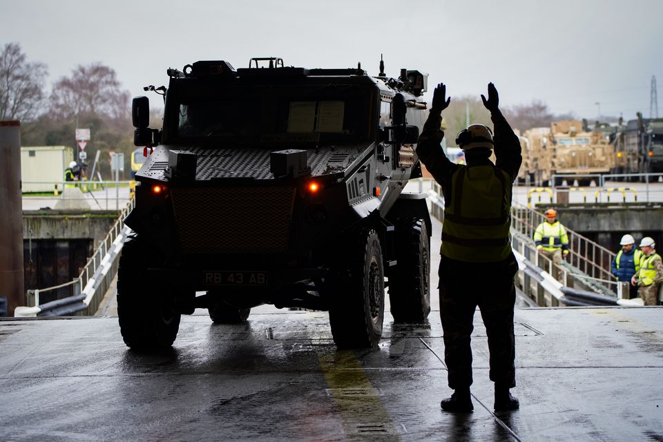 Vehicles and equipment are loaded onboard MV Anvil Point (Ben Birchall/PA)