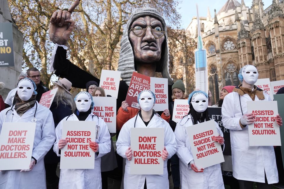 Opposition campaigners outside Parliament on Friday (Stefan Rousseau/PA)