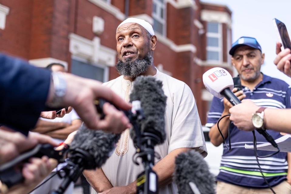 Ibrahim Hussein spoke to reporters outside Southport mosque (James Speakman/PA)