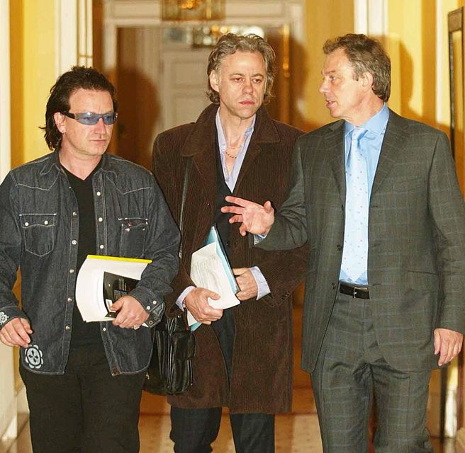 Tony Blair with Bob Geldof and Bono in No 10 Downing Street (PA)