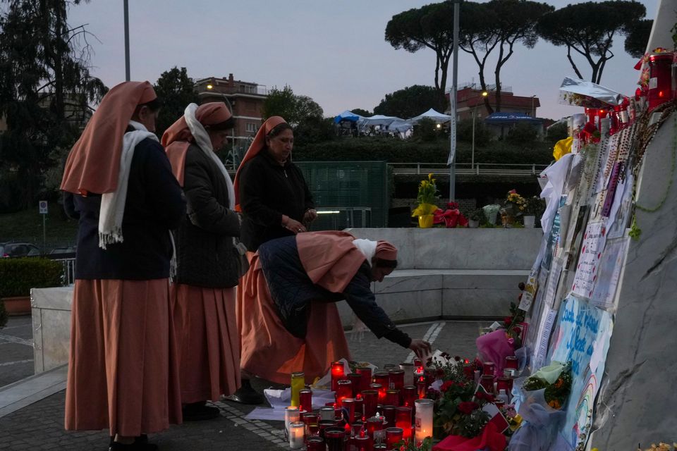 Nuns pray for Pope Francis in front of the Agostino Gemelli Polyclinic, in Rome (AP Photo/Andrew Medichini)