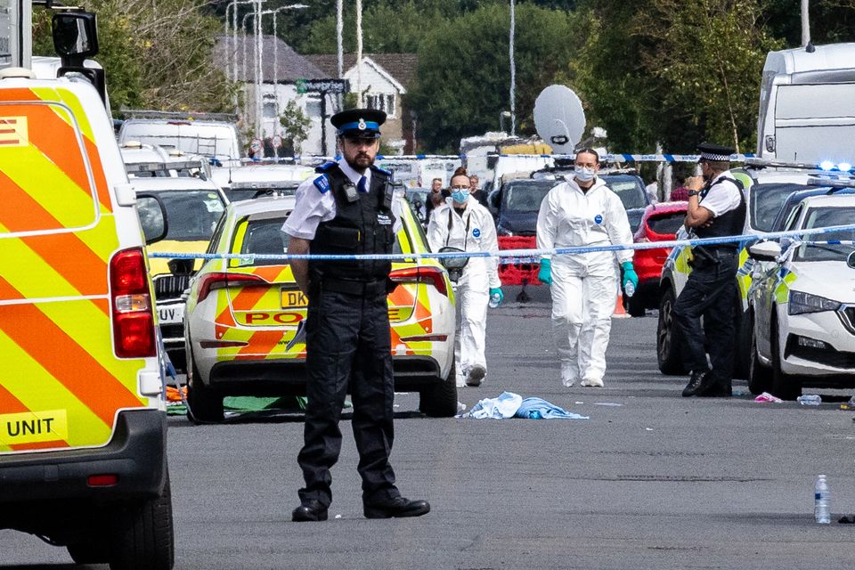 Forensic officers on Hart Street in Southport, Merseyside (James Speakman/PA)