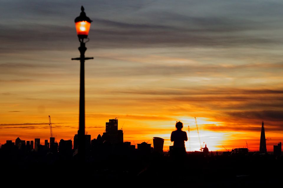 In Pictures: UK wakes to sunrises, snow and ice as temperatures plunge ...