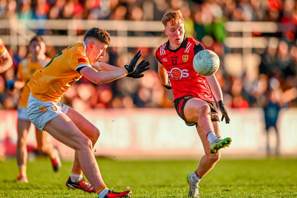 Down's Oisín Savage in action against Antrim's Eunan Walsh during the Ulster SFC quarter-final at Páirc Esler in Newry, Down today. Photo: Ben McShane/Sportsfile