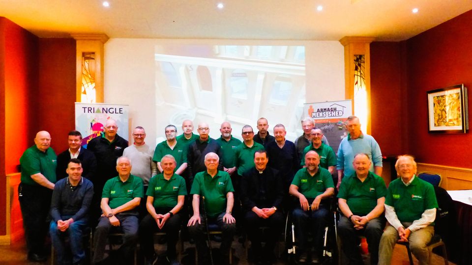 Armagh Men’s Shed with Dean Shane Forster at the launch of the model of St Patrick’s Cathedral. (Credit: Jonathan Hull)