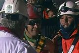 thumbnail: In this screen grab taken from video, Florencio Avalos, the first miner to be rescued, center, is greeted after his rescue at San Jose Mine near Copiapo, Chile. (AP Photo)