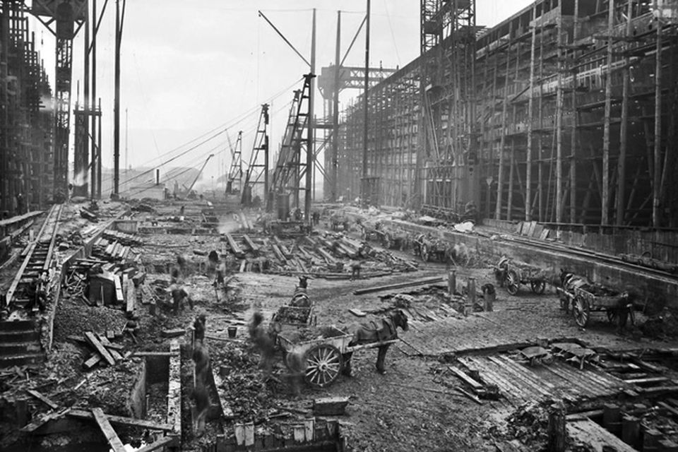 Workmen prepare the Titanic slipway. Photograph © National Museums Northern Ireland. Collection Harland & Wolff, Ulster Folk & Transport Museum