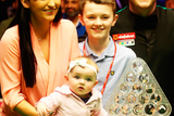 thumbnail: Mark Allen with his wife Kyla, stepson Robbie and daughter Harleigh after winning the Masters in January
