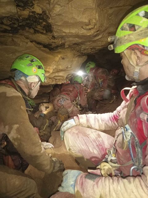 Rescue workers attempt to free Ottavia Piana, a caver blocked in a deep inside the Bueno Fonteno cave, near Bergamo, Italy (Soccorso Alpino/AP)