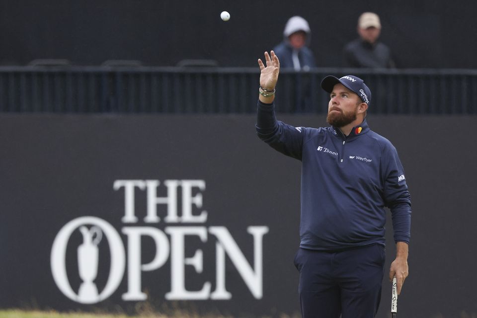 Shane Lowry insisted he would not get carried away by the prospect of a second Open title (Scott Heppell/AP)