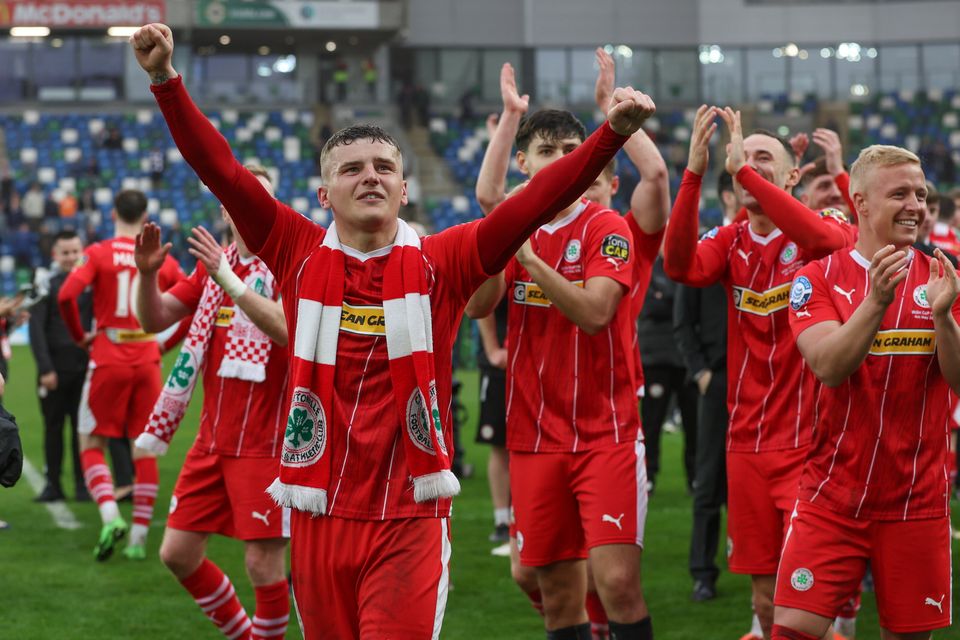 Cliftonville striker Ronan Hale soaks in the acclaim following the Reds' Irish Cup success