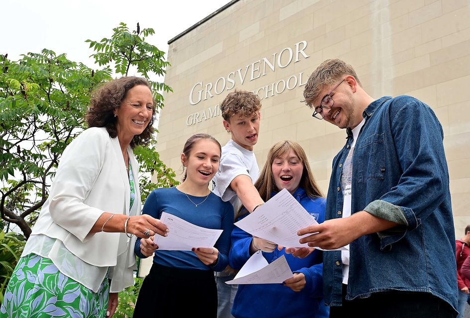 Grosvenor Grammar School Principal Dr F Vasey pictured with Weronika Stella, Conor Allen, Evie Bovill and Matthew Meredith. Picture By: Arthur Allison/Pacemaker Press.