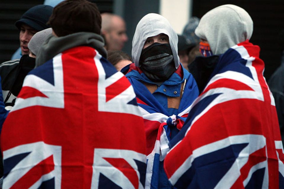 Protest outside the Alliance Party office in East Belfast belonging to Naomi Long, following the decision by Belfast City Council to stop flying the union flag every day. PRESS ASSOCIATION Photo. Picture date: Tuesday December 4, 2012. See PA story ULSTER Flag. Photo credit should read: Paul Faith/PA Wire