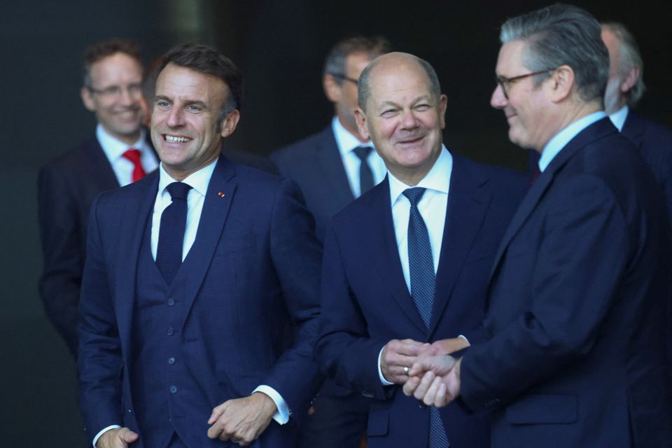 (left-right) French President Emmanuel, German Chancellor, Olaf Scholz and Prime Minister Sir Keir Starmer, at the Chancellery in Berlin (Nadja Wohlleben/PA)