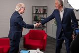 thumbnail: Eamonn Mallie shaking hands with former Prime Minister Tony Blair