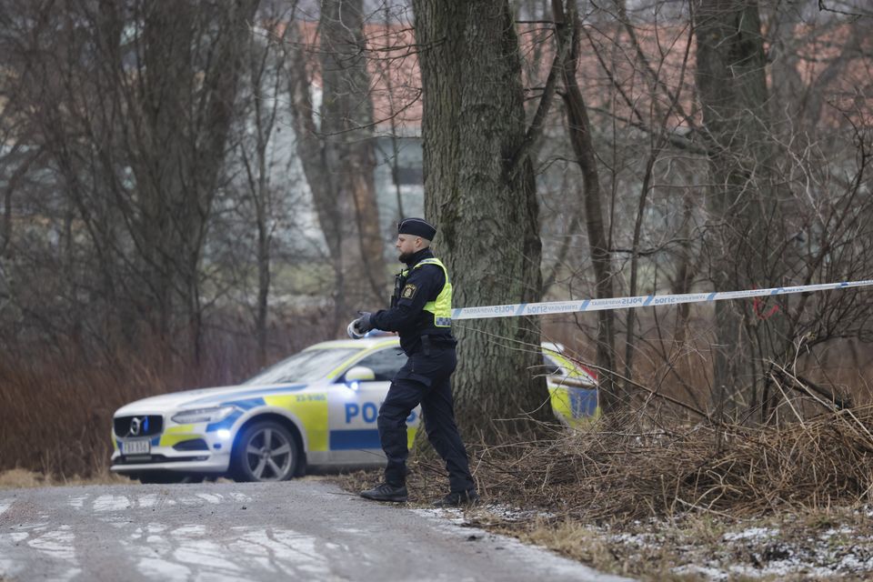 Police at the scene of the shooting in Orebro (Kicki Nilsson/TT News Agency/AP)