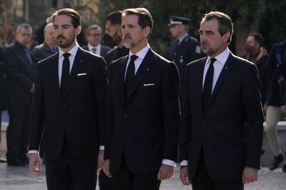 Prince Philippos, left, Prince Pavlos, centre, and Prince Nikolaos, right, sons of former king of Greece Constantine II at their father’s funeral in 2023 (Petros Giannakouris/PA)