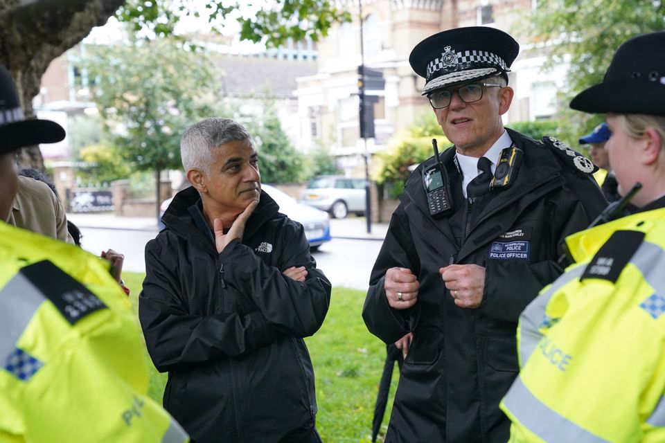 Mayor of London Sadiq Khan and Sir Mark Rowley speak to officers (PA)