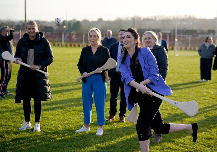 Michelle O’Neill and Emma Little-Pengelly during a visit to a GAA club in west Belfast in March 2024