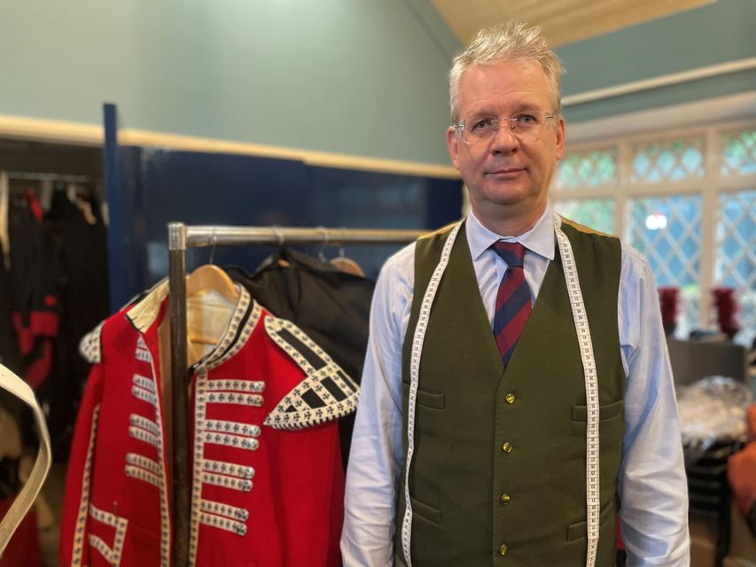 Lee Dawson of Samuel Brothers crafted the new uniforms which will be worn by the Hillsborough Fort Guard (Jonathan McCambridge/PA)