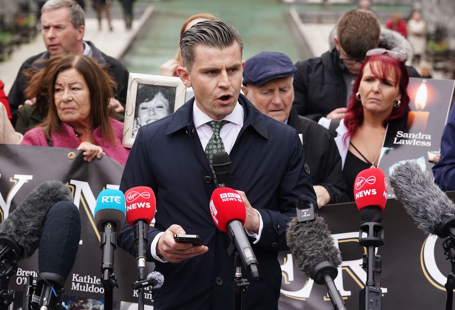 Solicitor Darragh Mackin speaking to the media with Stardust campaigners (Brian Lawless/PA)