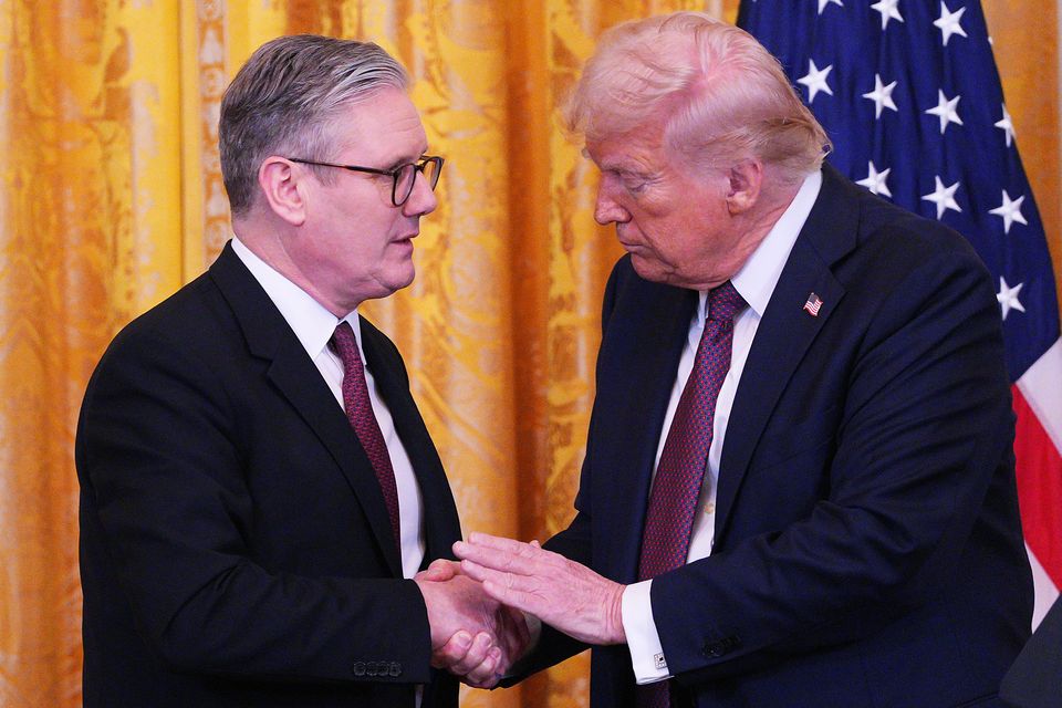 US President Donald Trump (right) and Prime Minister Sir Keir Starmer hold a joint press conference in the East Room at the White House in Washington DC after their meeting in the Oval Office (Carl Court/PA)