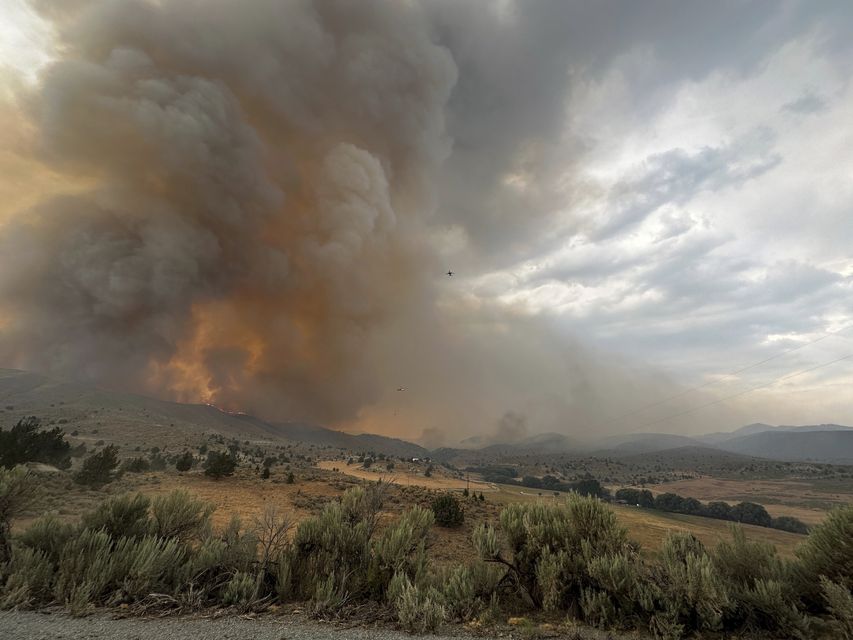 Smoke rises from a wildfire near Durkee in eastern Oregon (Brett Brown/USDA Forest Service/AP)