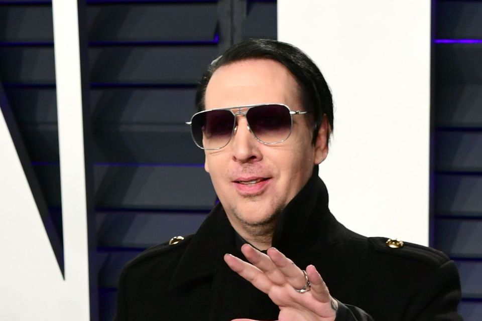 Singer Marilyn Manson dropped by record label after abuse claims