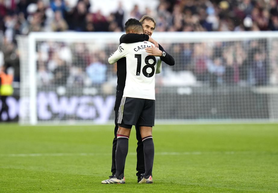 West Ham United manager Julen Lopetegui hugs Manchester United’s Casemiro (John Walton/PA)