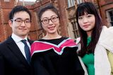 thumbnail: (L-R) Yikiang Ke, Lulu Bao and Ying King Shao from China celebrate Lulu's graduation at Queens's University. Lulu graduated with a Msc in TESOL (Teaching English to Speakers of Other Languages).