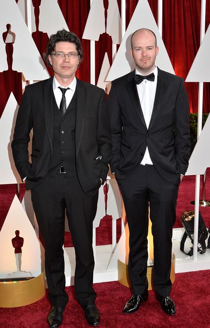 Writer Ronan Blaney (L) and director Michael Lennox attend the 87th Annual Academy Awards at Hollywood & Highland Center on February 22, 2015 in Hollywood, California.  (Photo by Lester Cohen/WireImage)