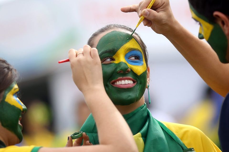 BRASILIA, BRAZIL - JUNE 23: Fans arrive before the Group A match between Brazil and Cameroon at Estadio Nacional on June 23, 2014 in Brasilia, Brazil. (Photo by Celso Junior/Getty Images)
