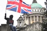 thumbnail: Loyalists taking part in a protest over the restrictions of flying the Union flag protesting outside Belfast City Hall