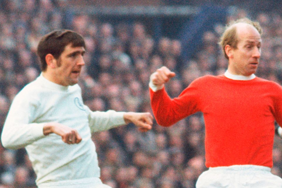 Bobby Charlton facing Norman Hunter in the early 1970s