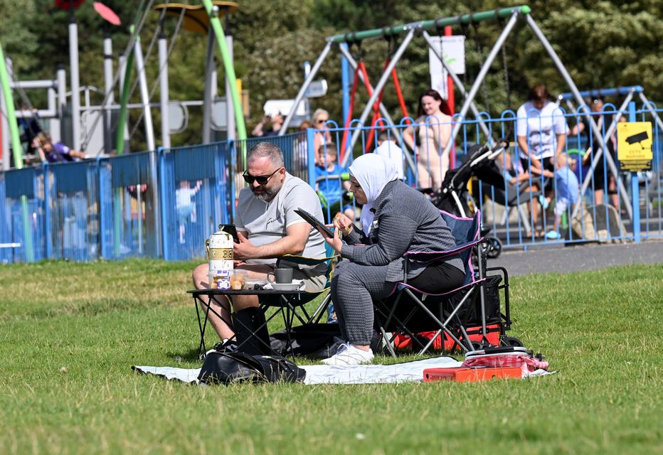 12th August  2024
A rare sunny August  day sees sun worshippers  at Seapark near Holywood 
Mandatory Credit /Stephen Hamilton
