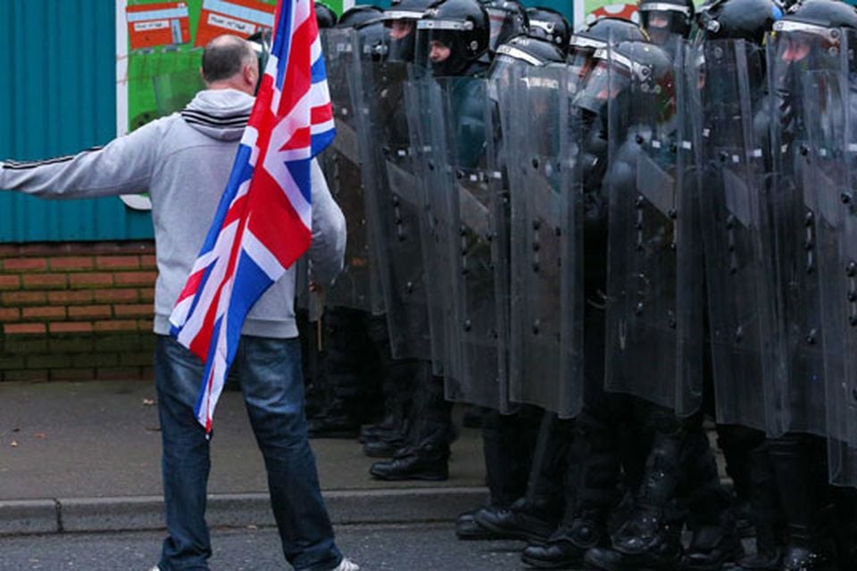 PSNI officers on the Lower Newtownards road, Belfast January 5 2013