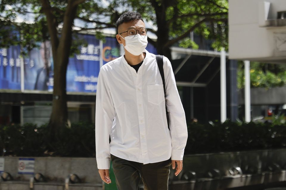 Patrick Lam, the former acting editor-in-chief of Hong Kong’s now shuttered pro-democracy news outlet Stand News, arrives at the District Court in Wan Chai, Hong Kong, ahead of sentencing (May James/AP)