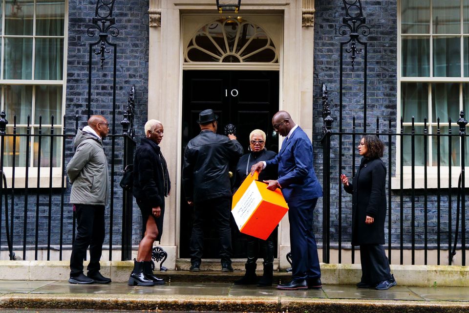 Windrush campaigners hand in a petition to 10 Downing Street (Victoria Jones/PA)