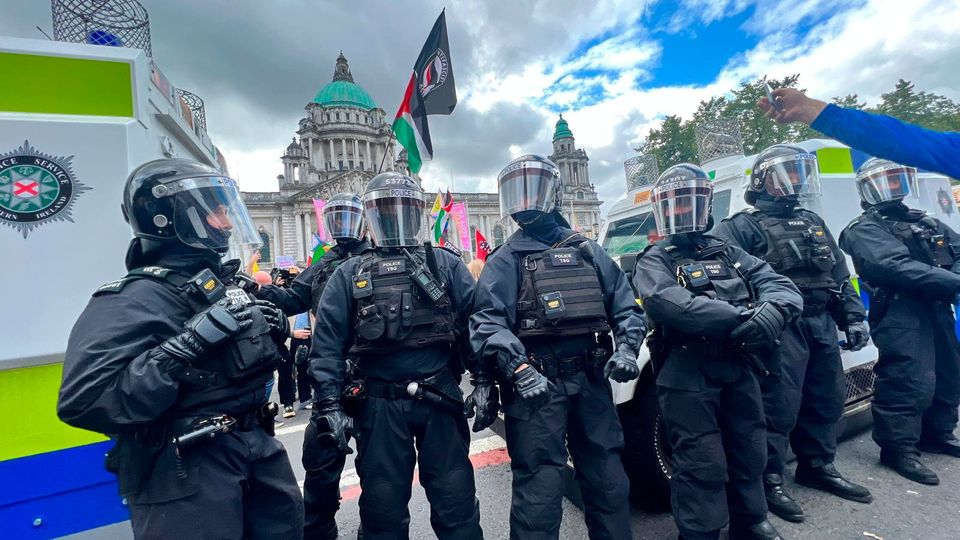 Police in riot gear deployed at City Hall. Photo: Kevin Scott.