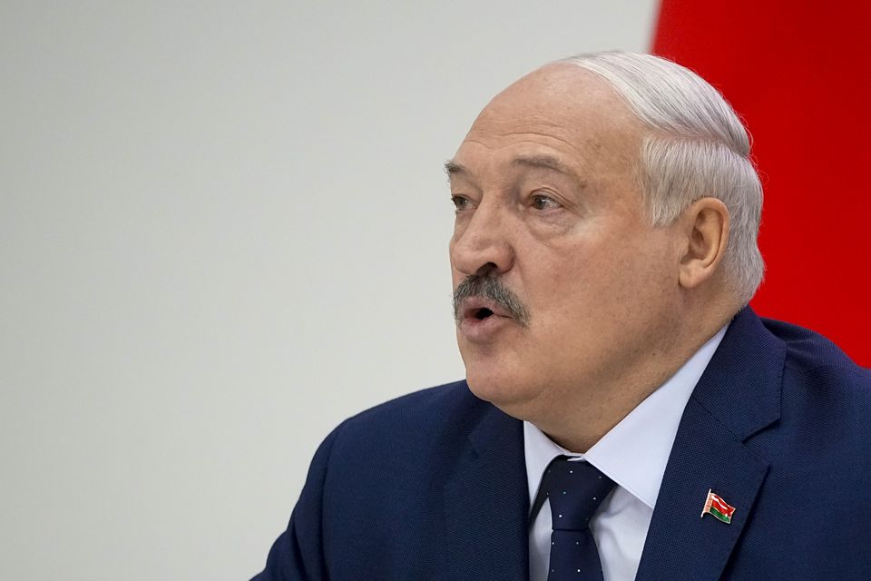 Belarusian President Alexander Lukashenko speaks to the media after voting in presidential elections in Minsk (Pavel Bednyakov/AP)