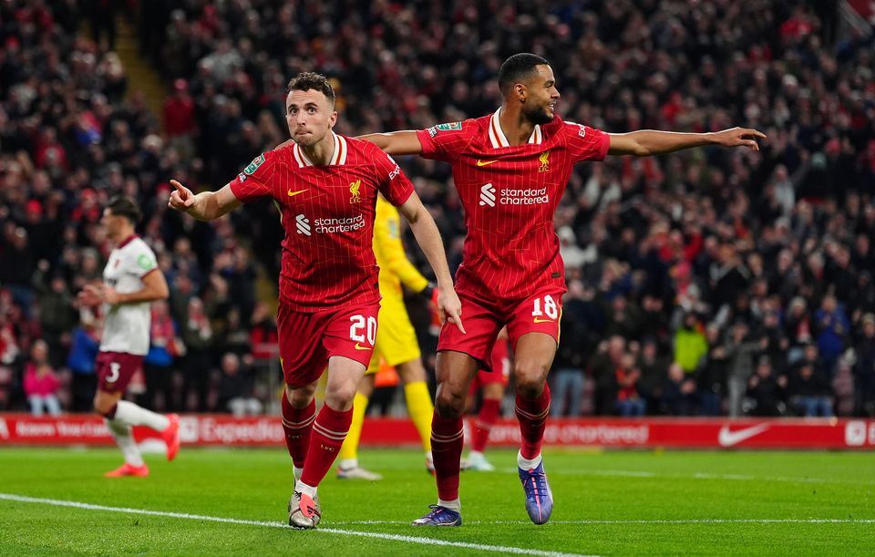 Diogo Jota, left, celebrates scoring for Liverpool (Peter Byrne/PA)