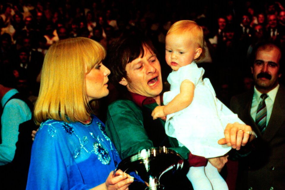 Alex Higgins with baby daughter Lauren and then wife Lynne after winning the 1982 World Snooker Championship
