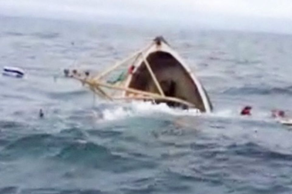 Video: Horror moment fishermen leap into sea as trawler sinks ...