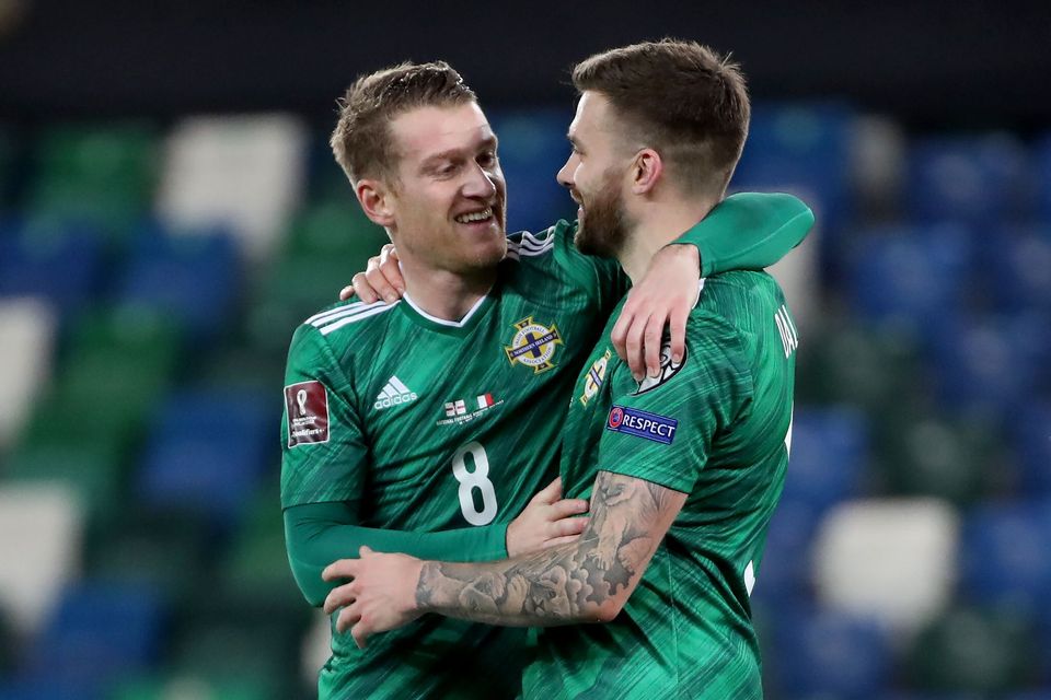 Steven Davis and Stuart Dallas after Northern Ireland's draw with Italy in a 2021 World Cup Qualifier