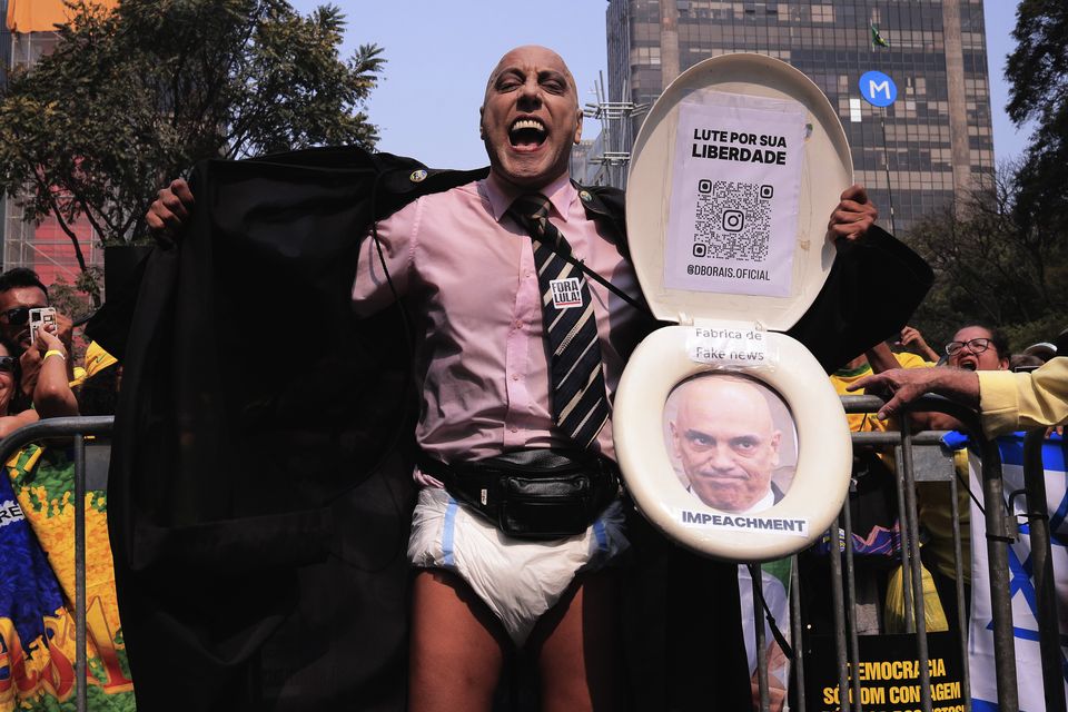 A protester mocks Supreme Court judge Alexandre de Moraes (AP)