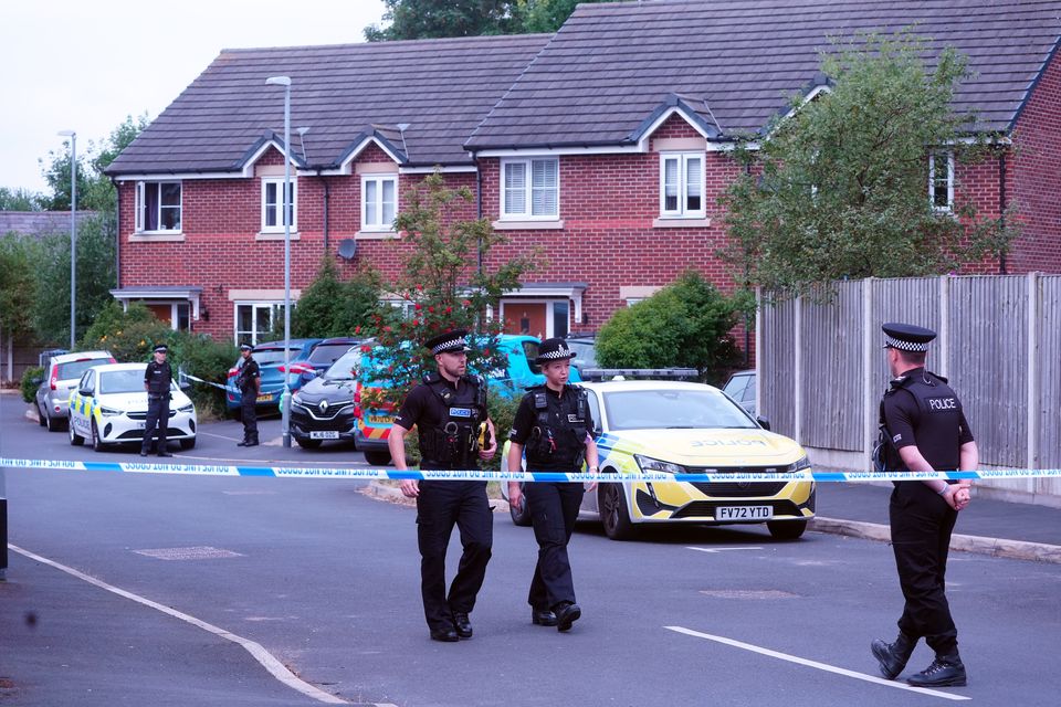 Emergency services at the home of 17-year-old Axel Rudakubana in Old School Close, Banks, near Southport earlier in the week (PA)