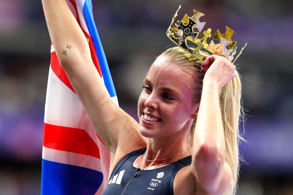 Keely Hodgkinson donned a gold crown during her victory lap (Peter Byrne/PA)