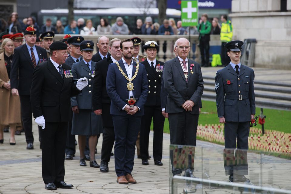 Belfast Lord Mayor Micky Murray and Dr Philip McGarry representing the King at the opening of the Field of Remembrance at Belfast City Hall (Liam McBurney/PA)